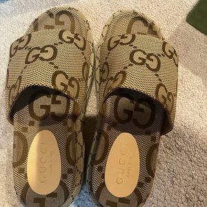 Tan and Brown Gucci platform slide.